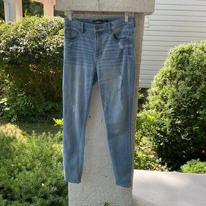 Express distressed straight leg 5 pocket styling jeans